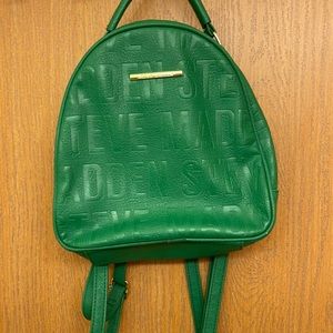 Green Steve Madden small back pack with gold tone zipper